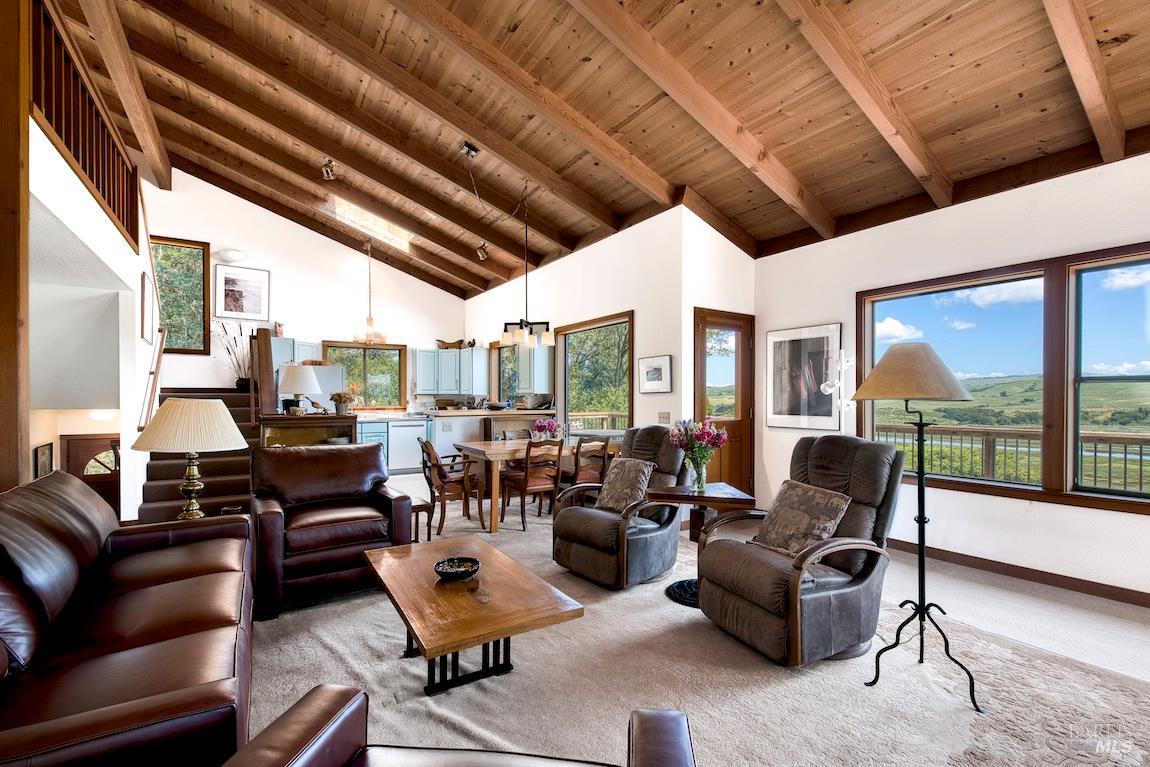 57 Laurel Street Inverness, CA 94956 - Photo 13 of 45 a living room with furniture or outdoor view and a large window
