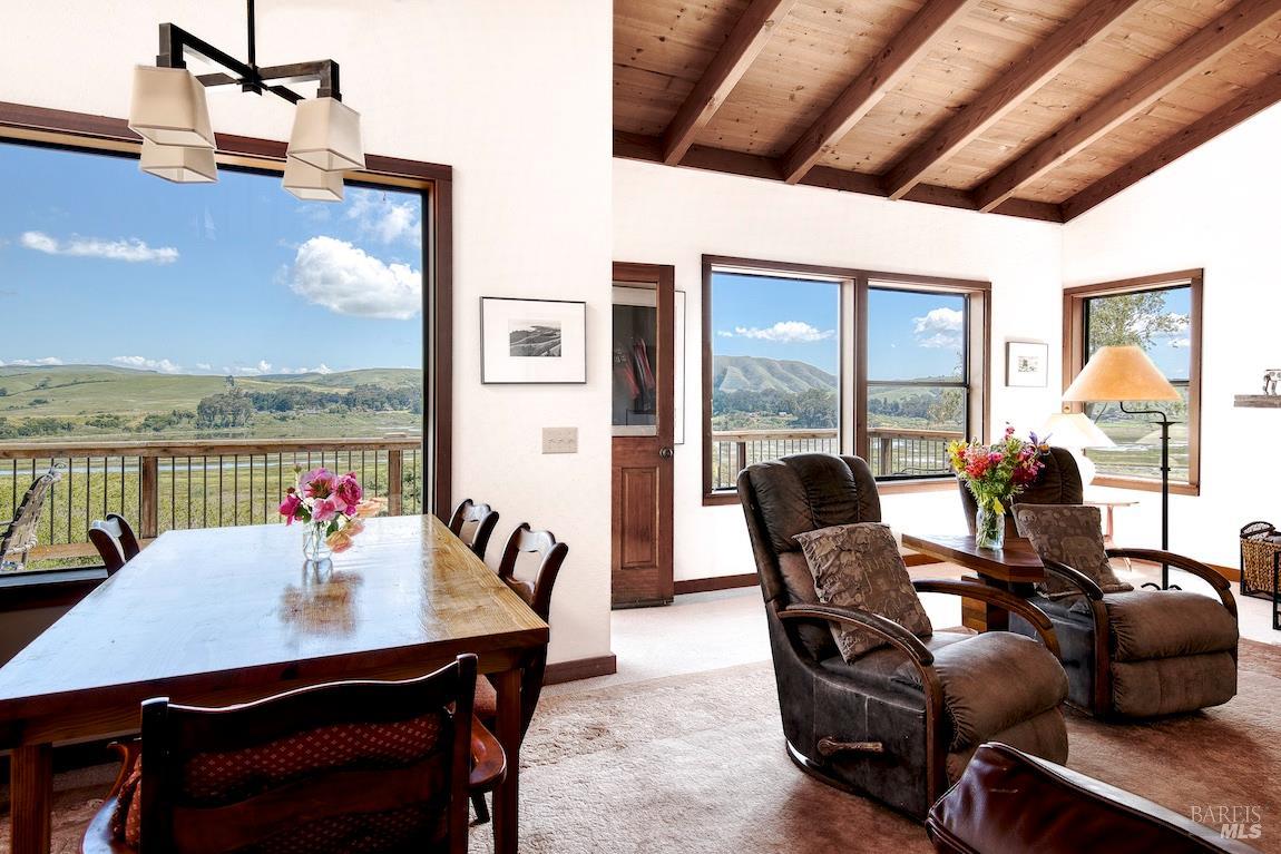 57 Laurel Street Inverness, CA 94956 - Photo 16 of 45 a view of a dining room with furniture window and outside view
