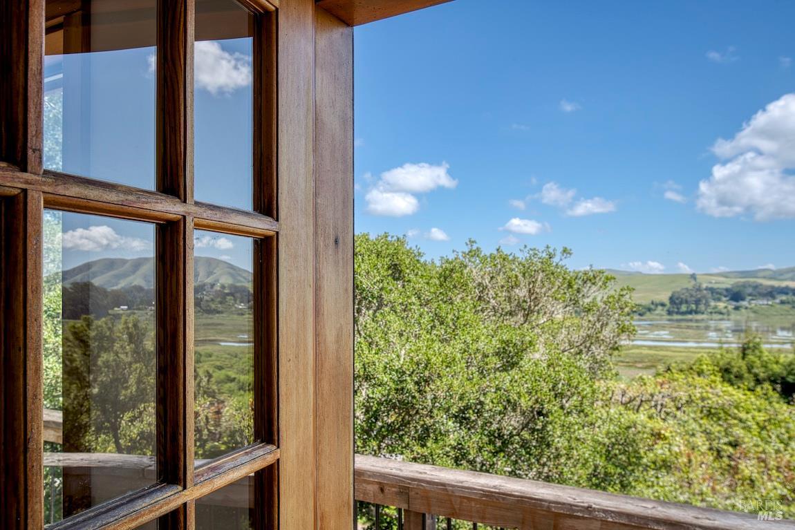 57 Laurel Street Inverness, CA 94956 - Photo 32 of 45 a view of a balcony with an outdoor space and seating