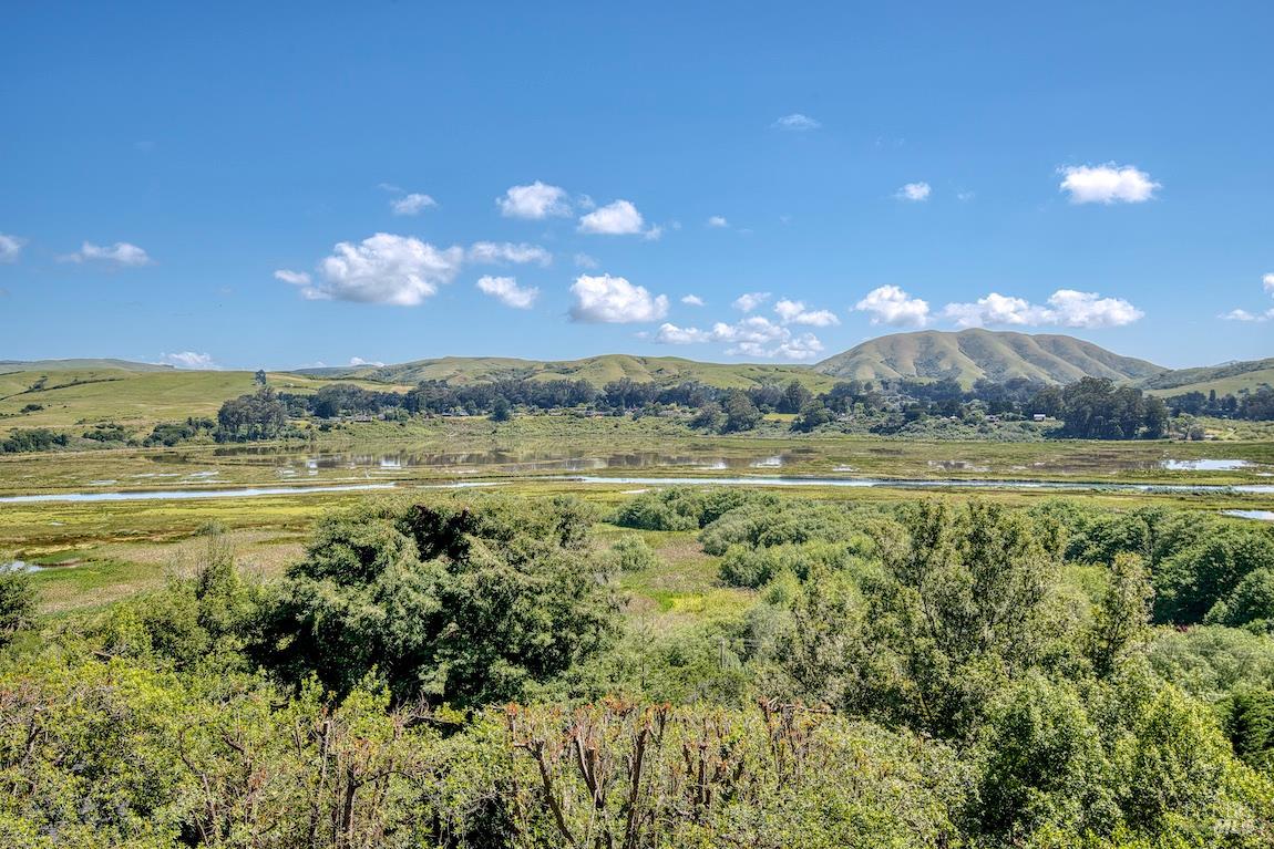 57 Laurel Street Inverness, CA 94956 - Photo 35 of 45 a view of a lake with a mountain