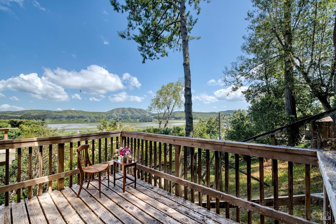 57 Laurel Street Inverness, CA 94956 - Photo 40 of 45 a view of a balcony with wooden floor & fence