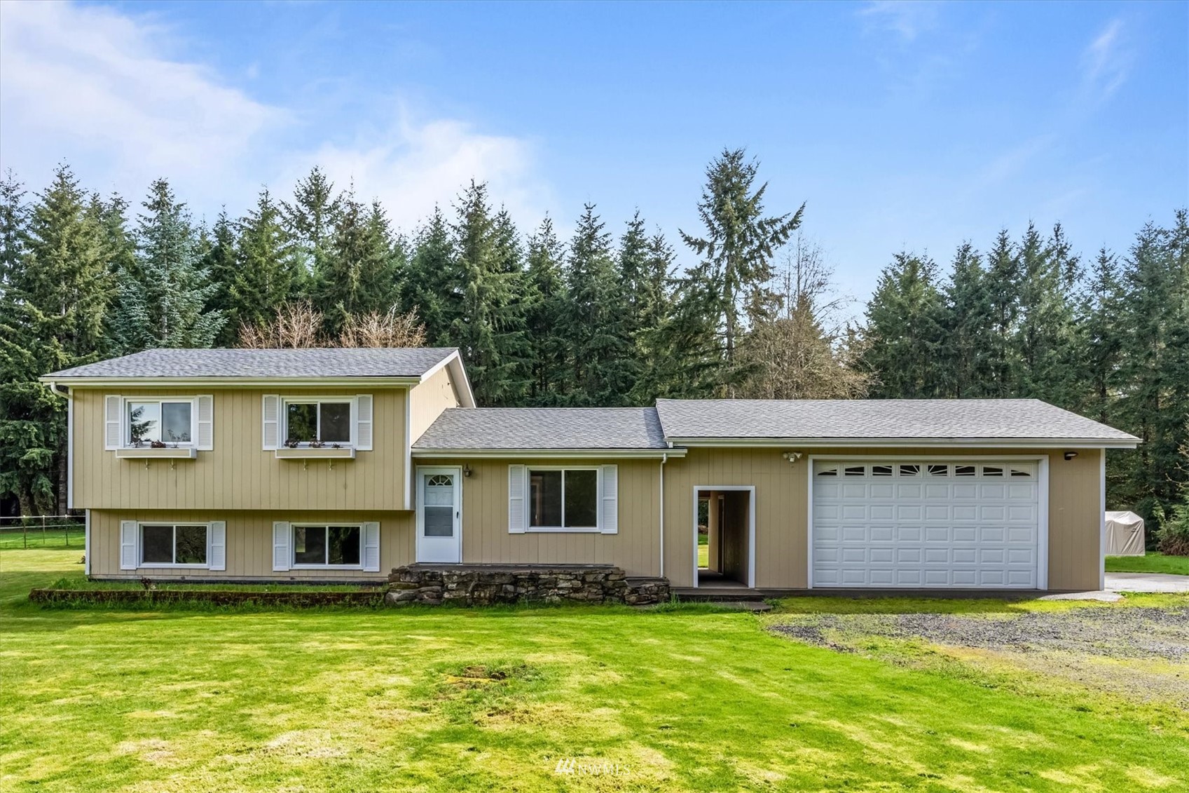 131 Tingle Road Winlock, WA 98596 - Photo 1 of 31 a view of a house with a garden