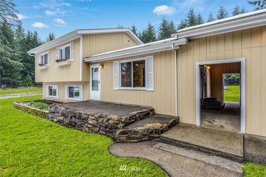 131 Tingle Road Winlock, WA 98596 - Photo 2 of 31 a view of a house with a yard