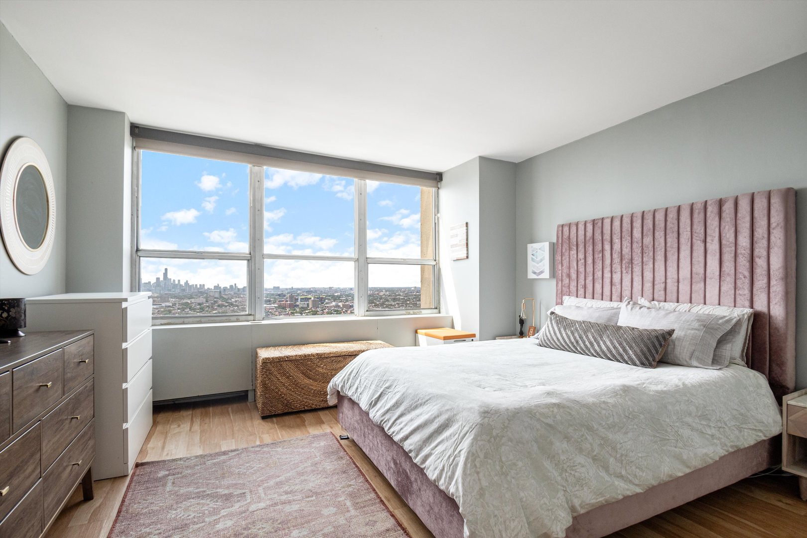 655 West Irving Park Road, Unit 3717 Chicago, IL 60613 - Photo 11 of 24 a bedroom with a bed and a large window