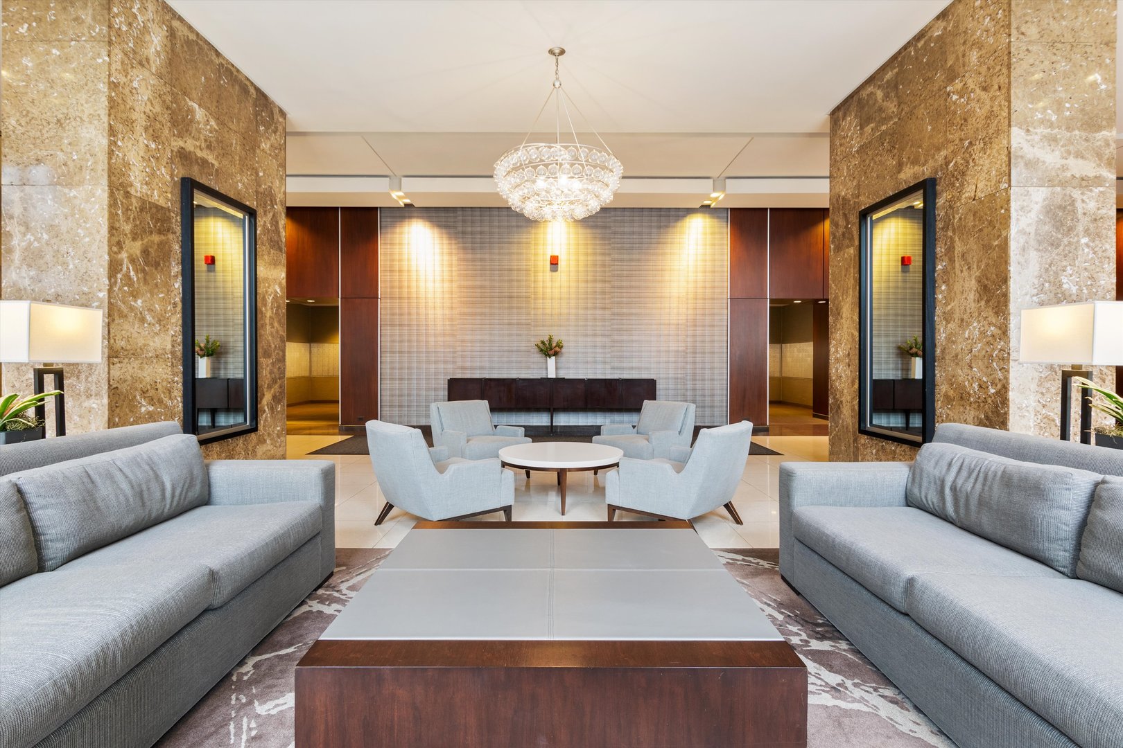 655 West Irving Park Road, Unit 3717 Chicago, IL 60613 - Photo 23 of 24 a living room with furniture chandelier and a large window