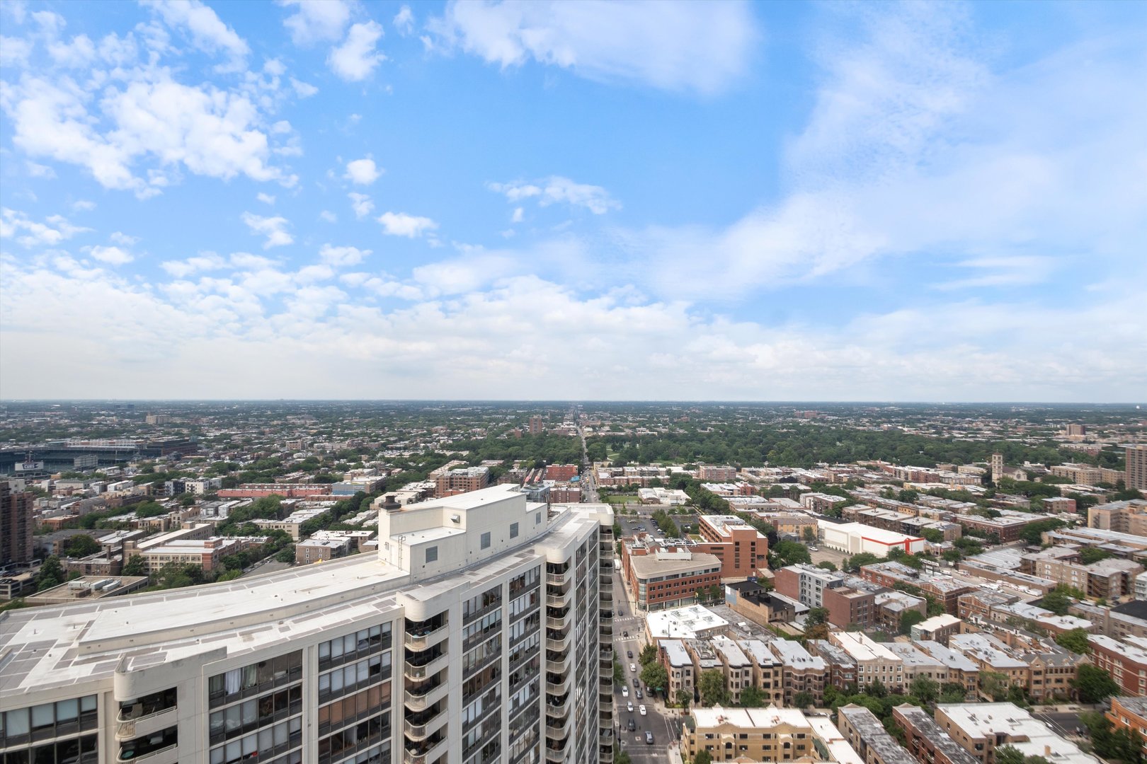 655 West Irving Park Road, Unit 3717 Chicago, IL 60613 - Photo 7 of 24 an aerial view of a city