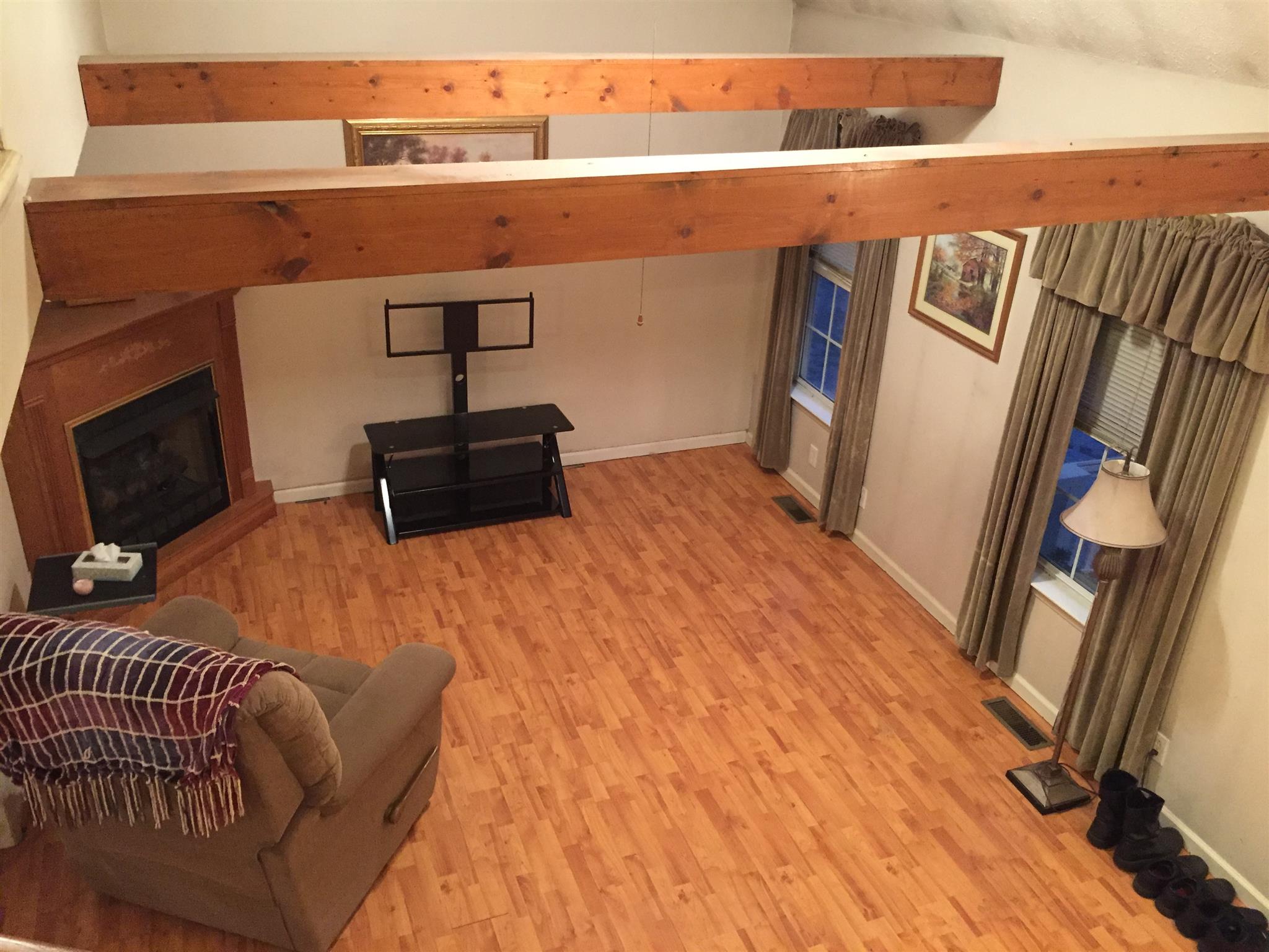 7040 Hoods Branch Road Springfield, TN 37172 - Photo 8 of 10 a bedroom with a bed and a flat screen tv