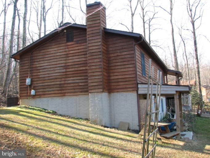 218 Long View Road Linden, VA 22642 - Photo 6 of 16 a view of a house with a backyard