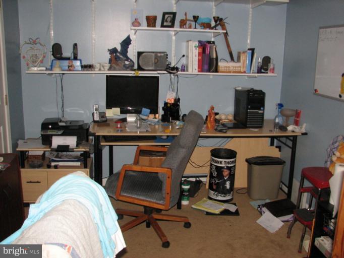 218 Long View Road Linden, VA 22642 - Photo 8 of 16 a view of a workspace with furniture and toys
