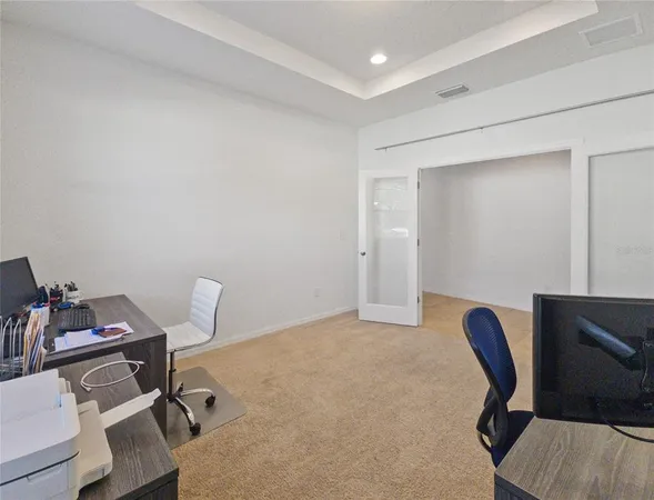 a view of workspace with lounge chair