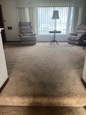 a view of entryway with a front door