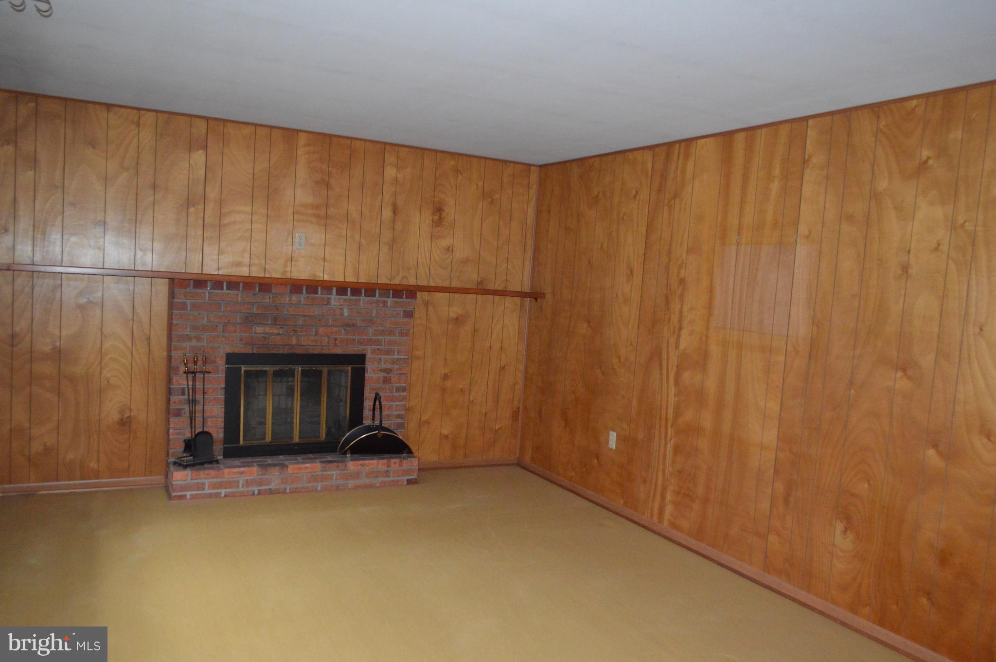 57 Porter Road North East, MD 21901 - Photo 3 of 27 Wood burning fireplace with brick hearth