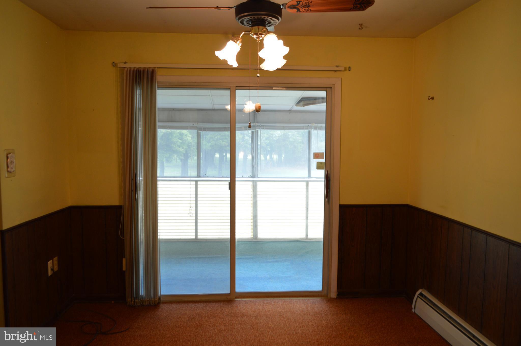 57 Porter Road North East, MD 21901 - Photo 8 of 27 Dining Room, slider to screened porch & patio