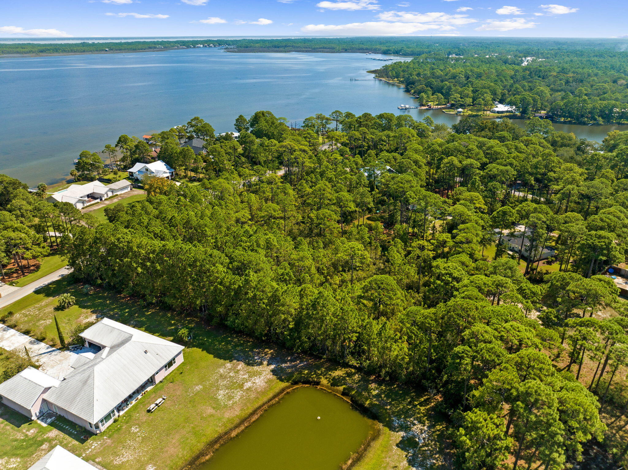 Lot 30 Woodland Bayou Drive Santa Rosa Beach, FL 32459 - Photo 22 of 28 a view of a lake with a mountain