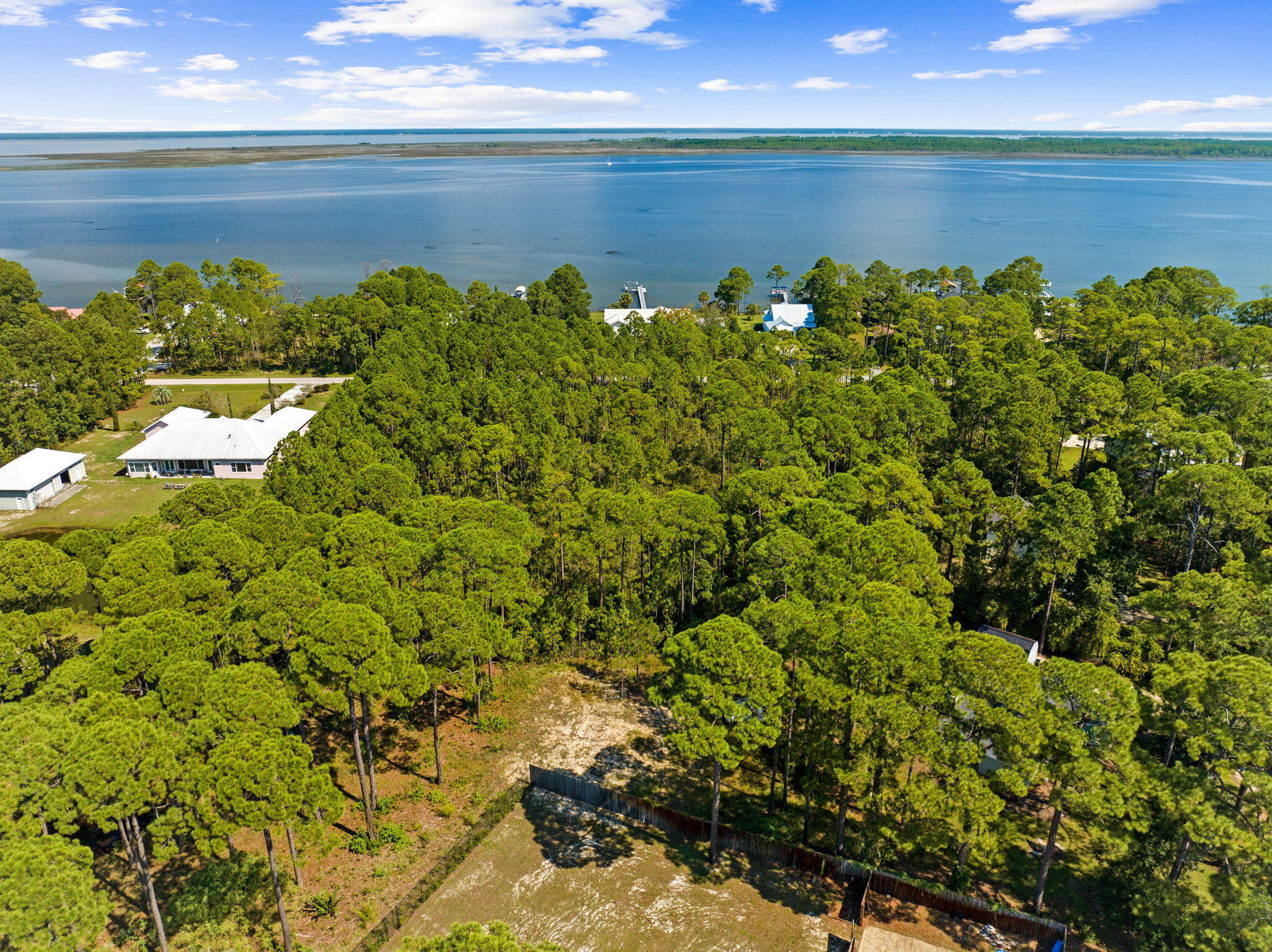 Lot 30 Woodland Bayou Drive Santa Rosa Beach, FL 32459 - Photo 24 of 28 a view of a garden with a lake
