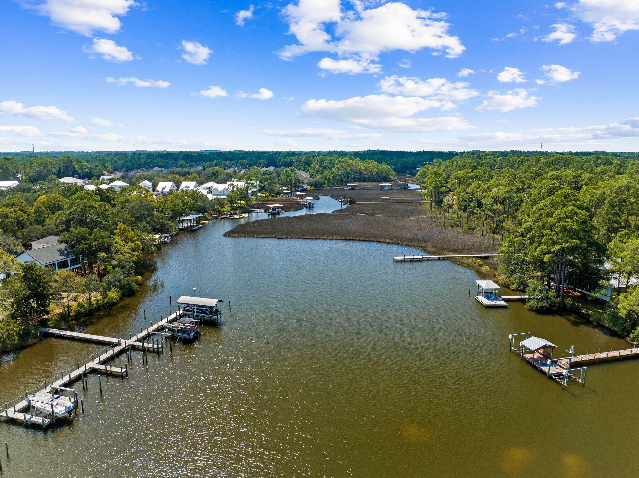 Lot 30 Woodland Bayou Drive Santa Rosa Beach, FL 32459 - Photo 25 of 28 a view of a lake with houses