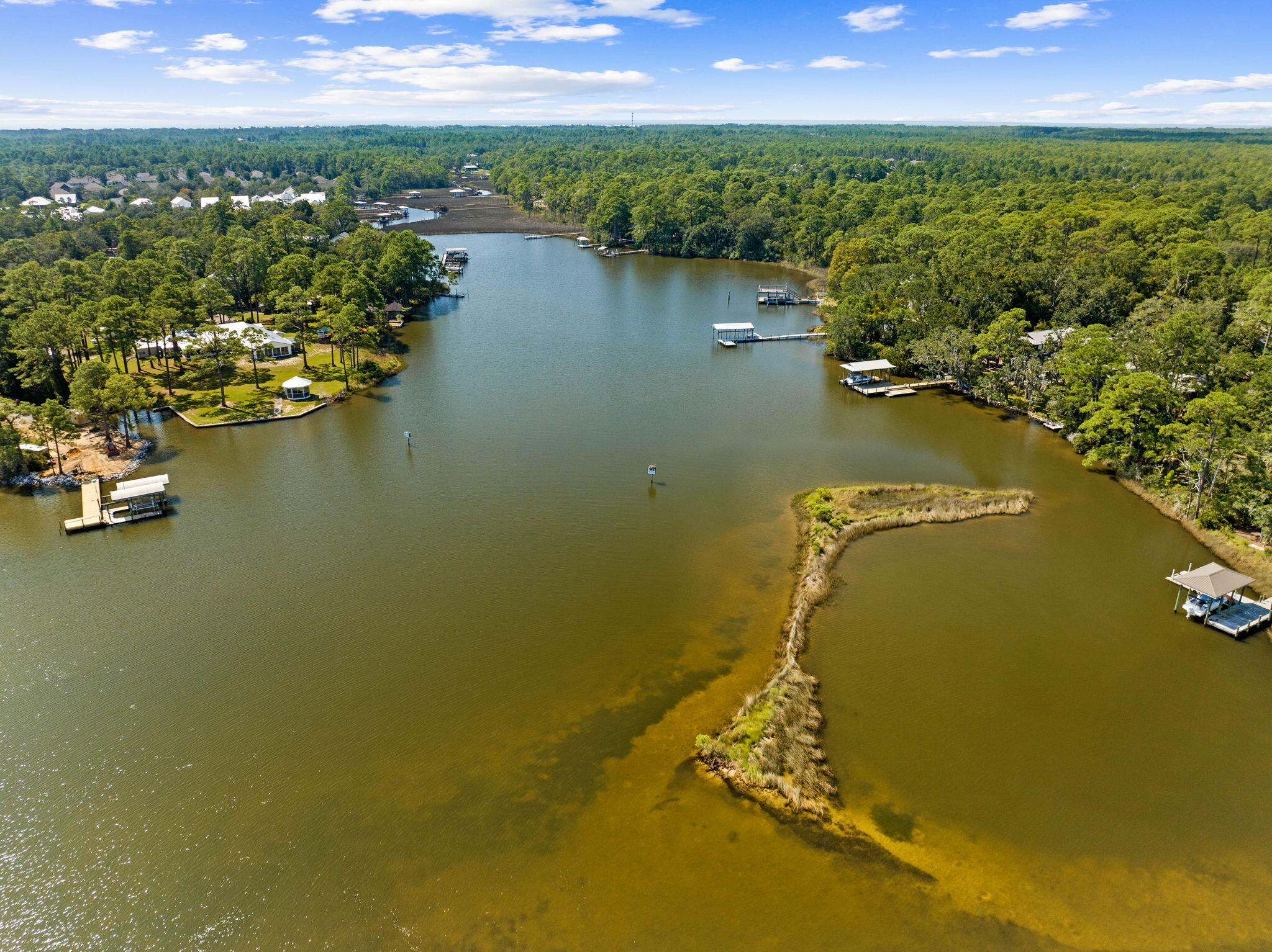 Lot 30 Woodland Bayou Drive Santa Rosa Beach, FL 32459 - Photo 26 of 28 a view of a lake with a city