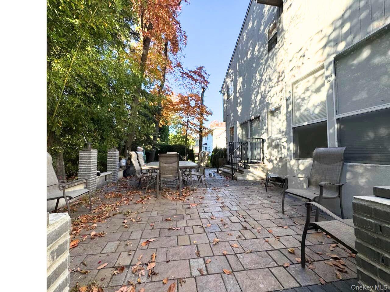 21 Cary Road Great Neck, NY 11021 - Photo 17 of 17 View of patio featuring outdoor dining space