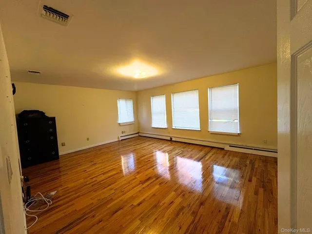a view of an empty room and window