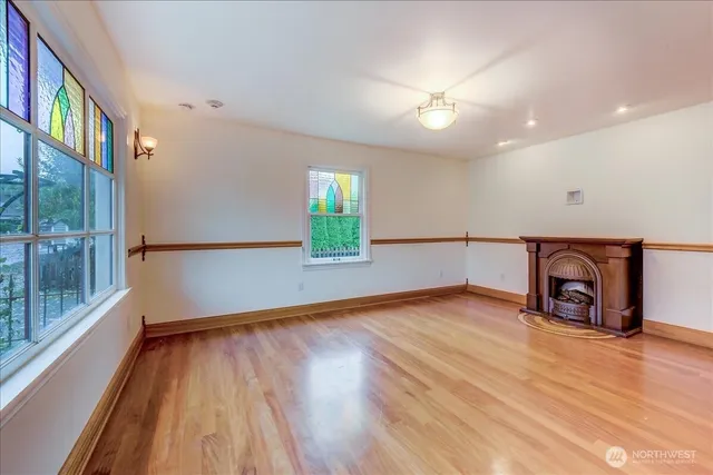 a view of a livingroom with wooden floor
