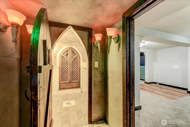 an aerial view of multiple houses with a yard