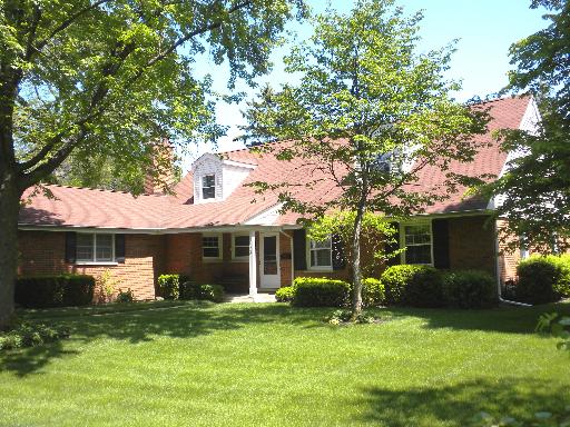 941 Red Haw Road Northbrook, IL 60062 - Photo 1 of 5 a view of a house with a yard and a large tree