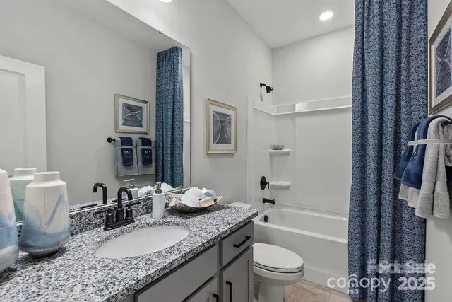 a bathroom with a toilet and a sink