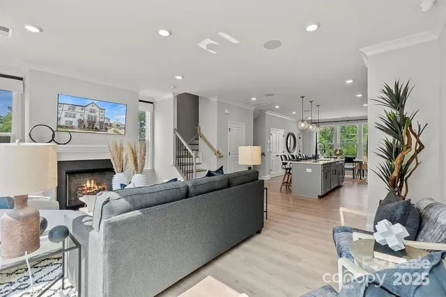 a kitchen with sink a stove and a wooden cabinets