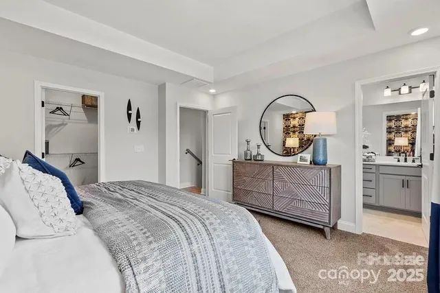 a bathroom with a double vanity sink toilet and shower