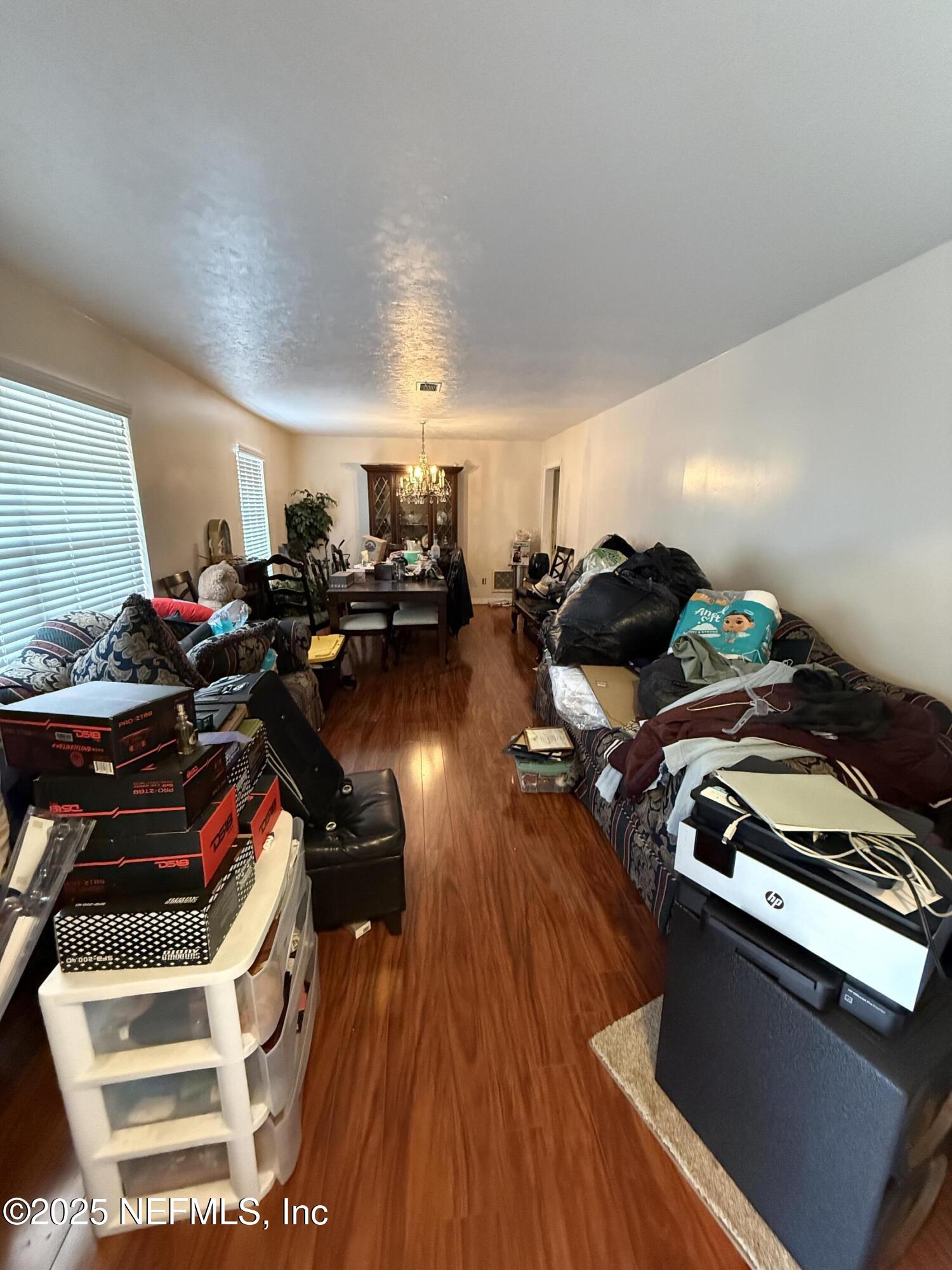 3976 Raintree Road Jacksonville, FL 32277 - Photo 3 of 13 LIVING-DINING COMBO