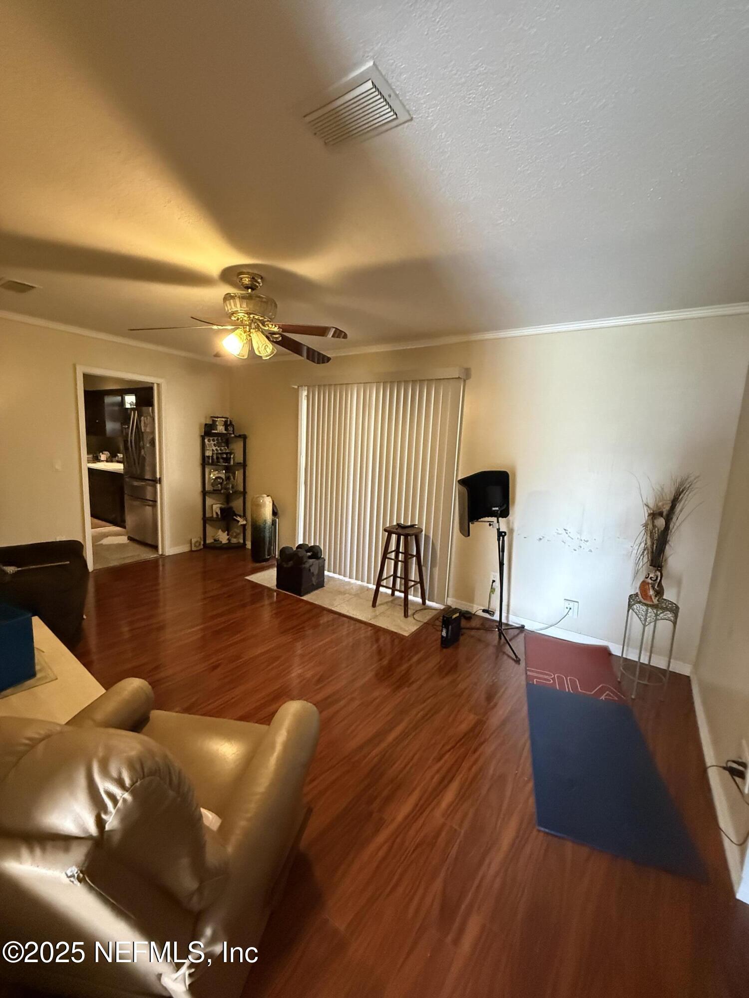 3976 Raintree Road Jacksonville, FL 32277 - Photo 6 of 13 FAMILY ROOM-VIEW FROM FOYER