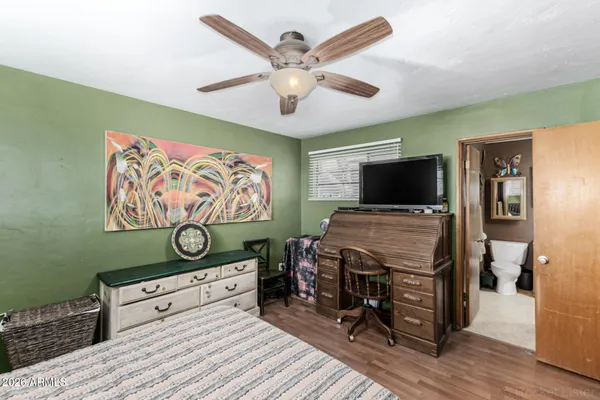 a room with furniture and flat screen tv