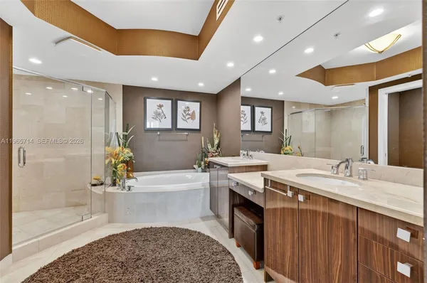 a bedroom with a bed and a lamp