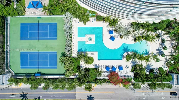 a view of a patio with a yard