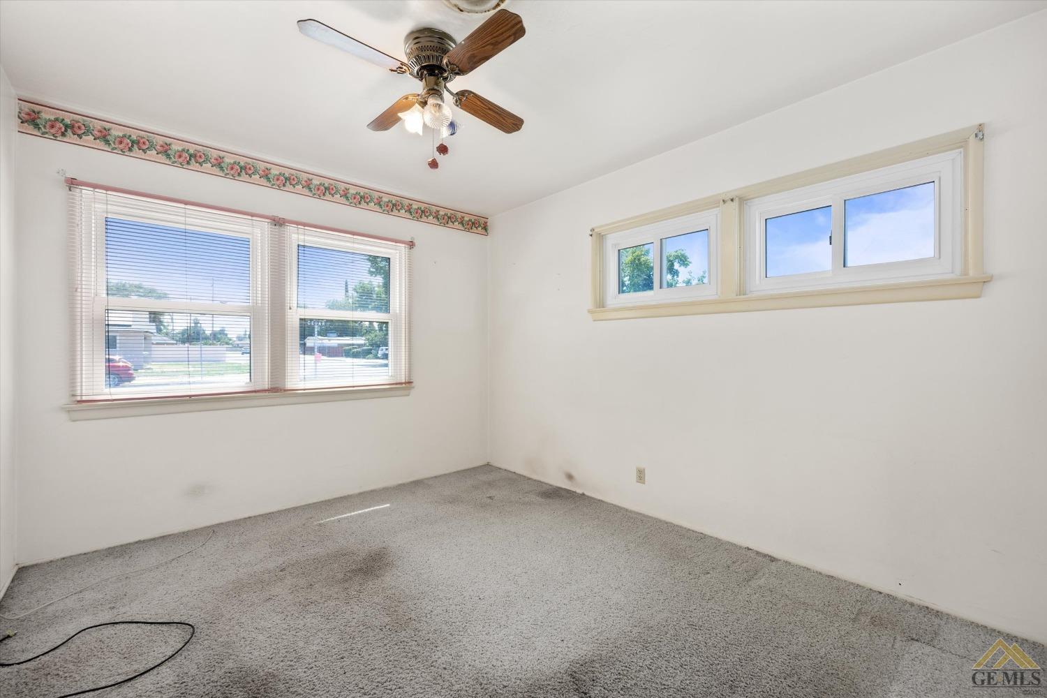 Undisclosed Address Wasco, CA 93280 - Photo 14 of 21 a view of room with a ceiling fan