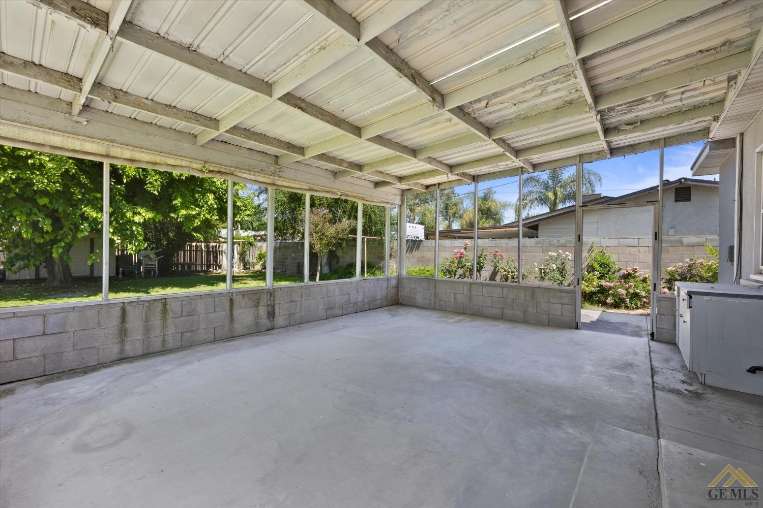Undisclosed Address Wasco, CA 93280 - Photo 16 of 21 a view of an empty room with a balcony