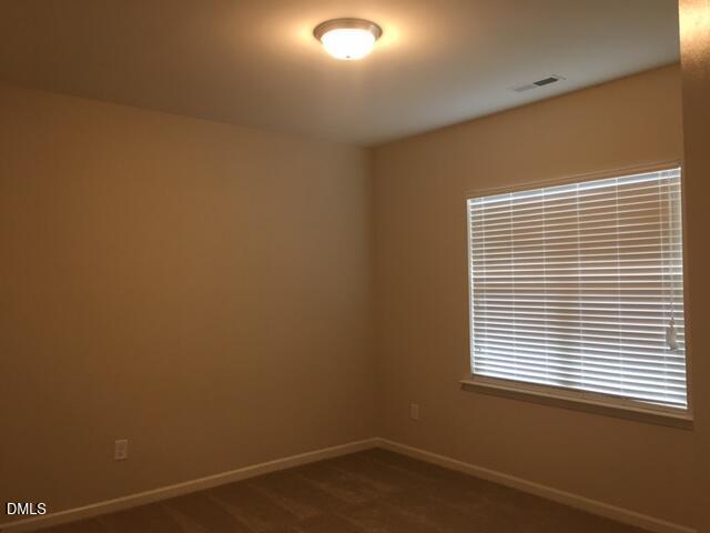 134 Zante Currant Road, Unit 134 Durham, NC 27703 - Photo 12 of 14 a view of a small space with a window