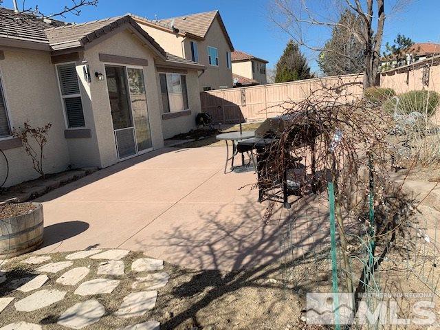 2581 Spring Flower Drive Reno, NV 89521 - Photo 14 of 14 a view of a house with a yard covered in snow
