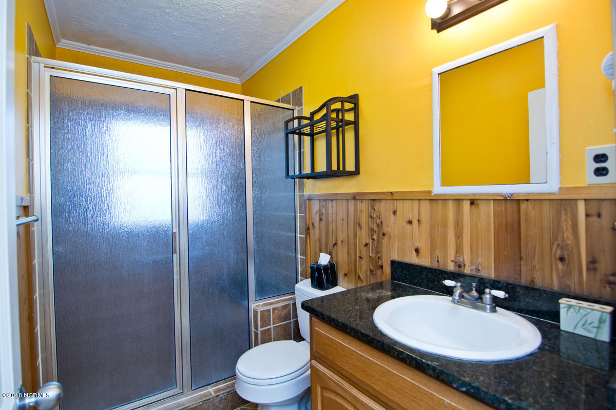 203 Hoffman Beach Road Atlantic Beach, NC 28512 - Photo 16 of 50 Walk in showers in both bathrooms make it easy for elderly family members or guests.