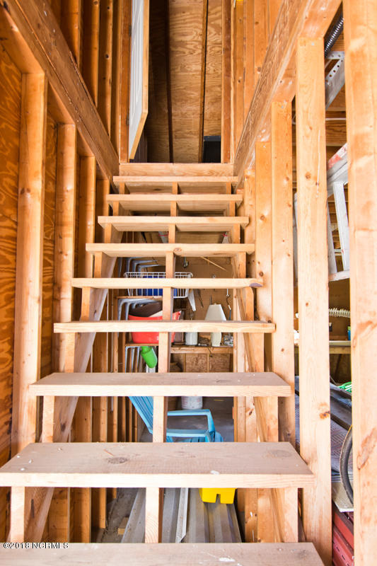 203 Hoffman Beach Road Atlantic Beach, NC 28512 - Photo 21 of 50 Stairs lead to an unfinished room