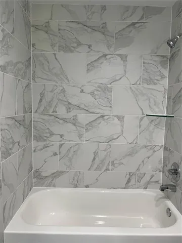 a bathroom with a bathtub