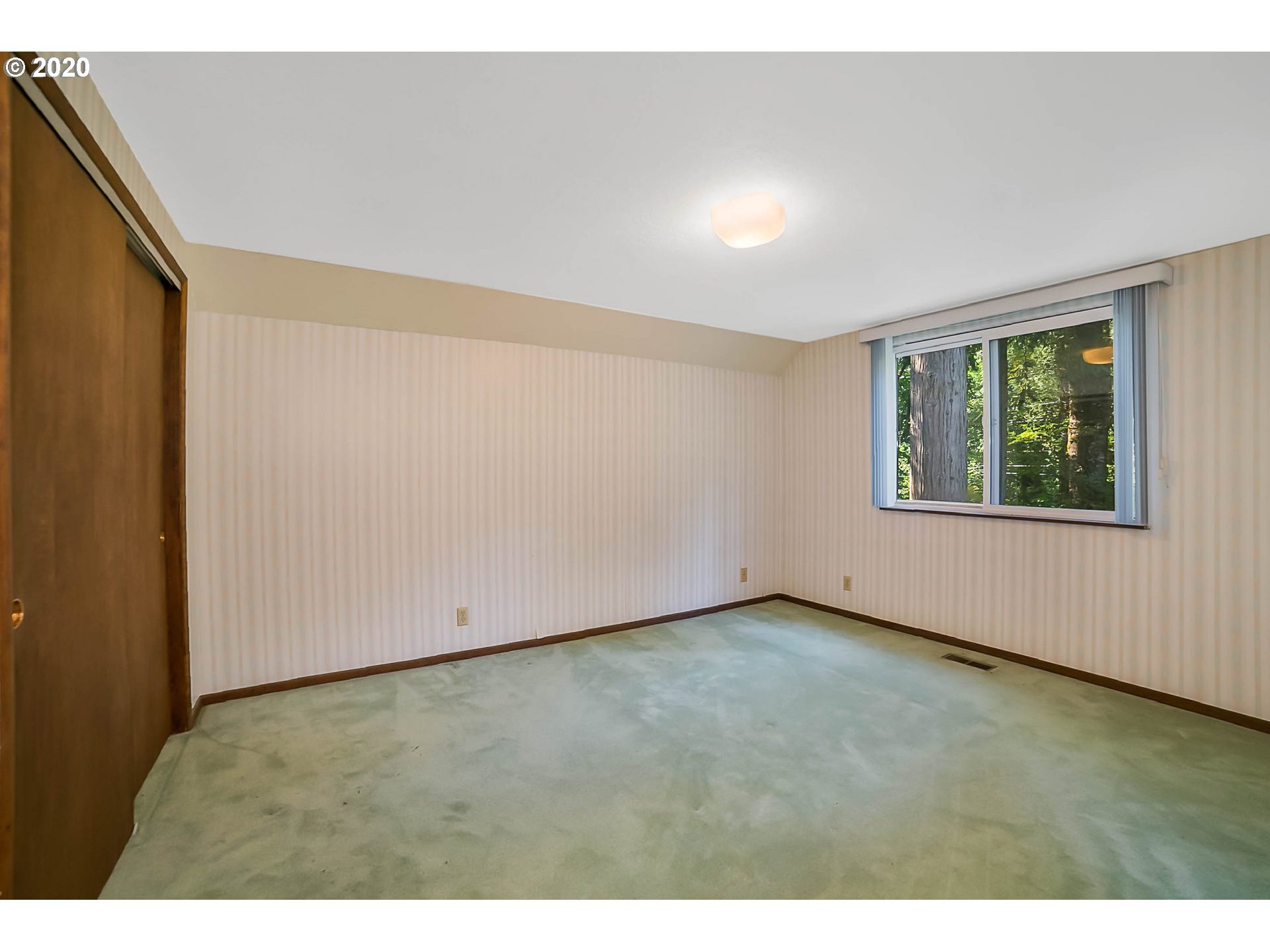 65279 East Timberline Drive Rhododendron, OR 97049 - Photo 17 of 32 a view of an empty room with a window