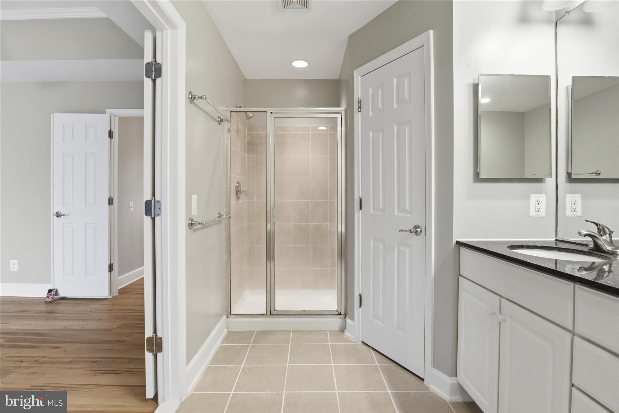 42906 Bittner Square Ashburn, VA 20148 - Photo 19 of 31 a bathroom with a shower and a sink