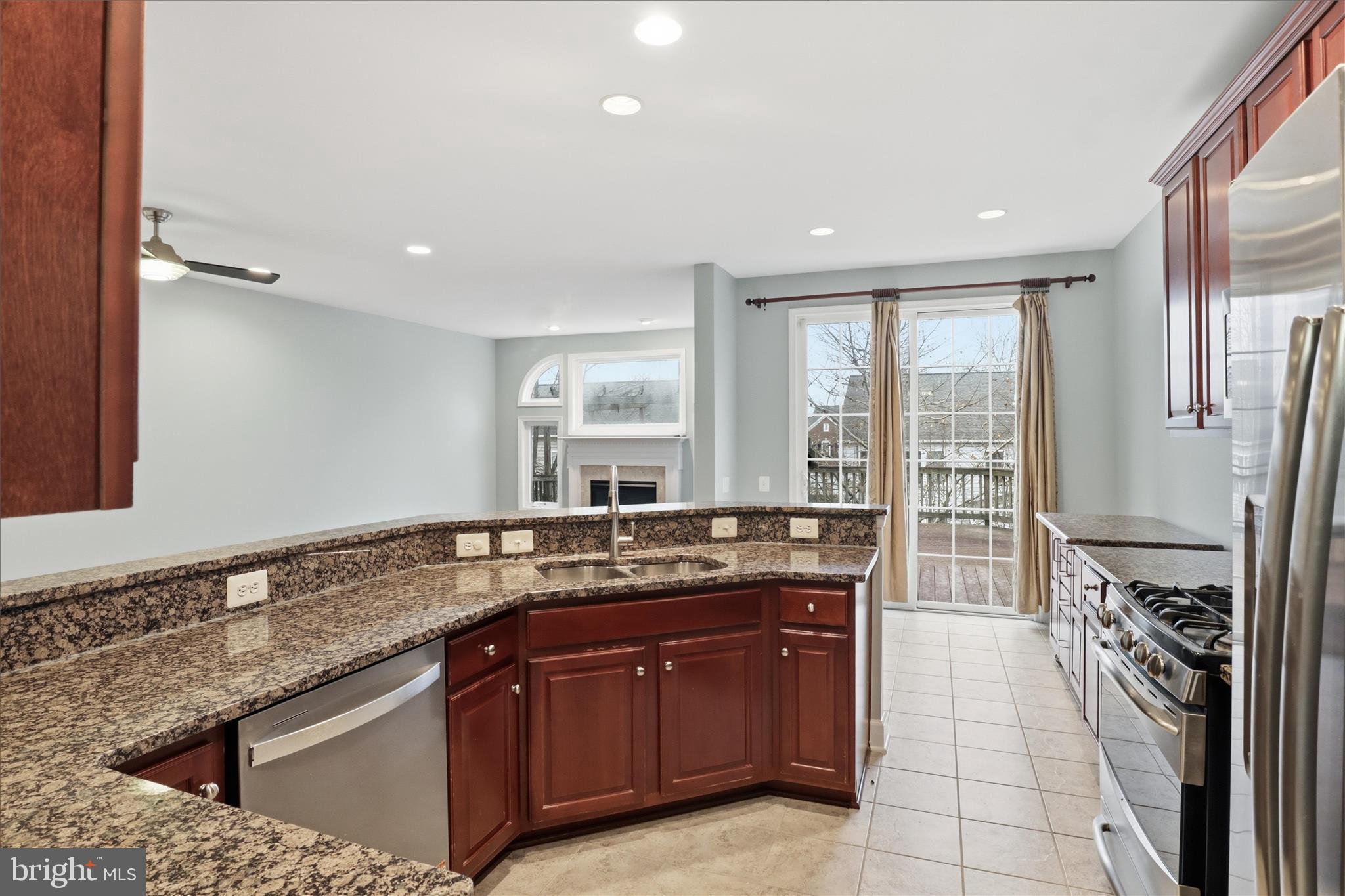 42906 Bittner Square Ashburn, VA 20148 - Photo 9 of 31 a spacious bathroom with a granite countertop sink and a large mirror