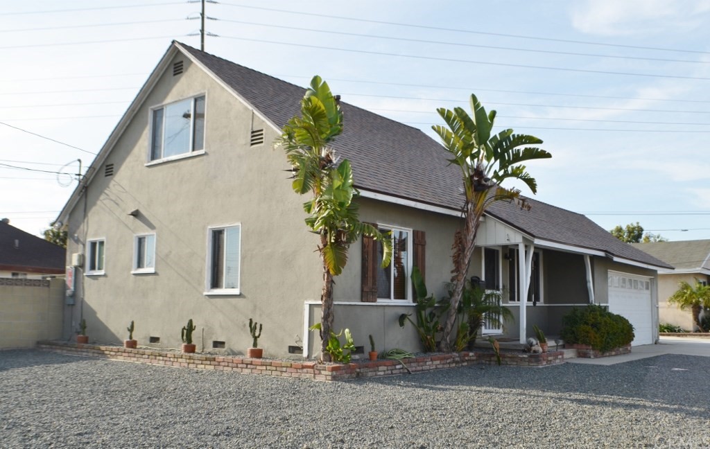 13712 Sioux Road Westminster, CA 92683 - Photo 1 of 1 a front view of a house with a yard