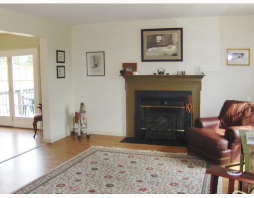 184 Brownsdale Road Butler, PA 16002 - Photo 3 of 15 Living Room. Bright living room with log burning fireplace.