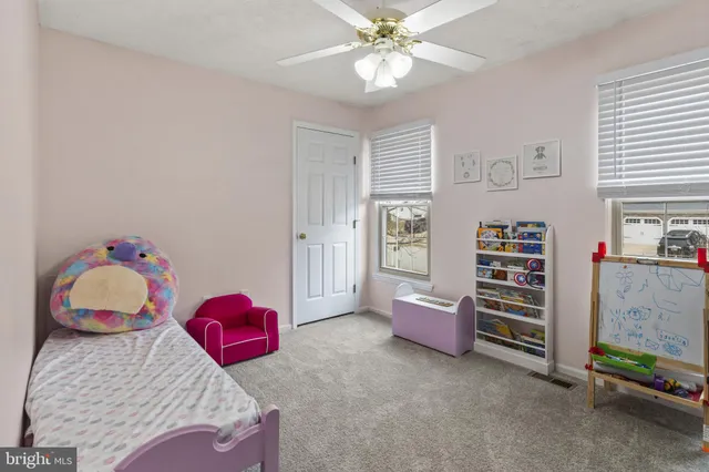 a bedroom with a bed and closet