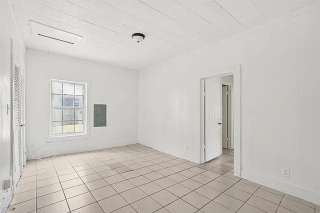 a view of an empty room and window