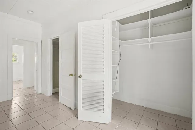 a view of an empty walk in closet