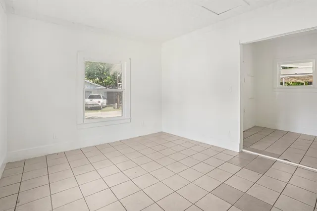 a view of an empty room and window